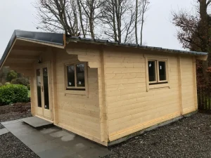 Light-coloured log home with clean pathway and side window